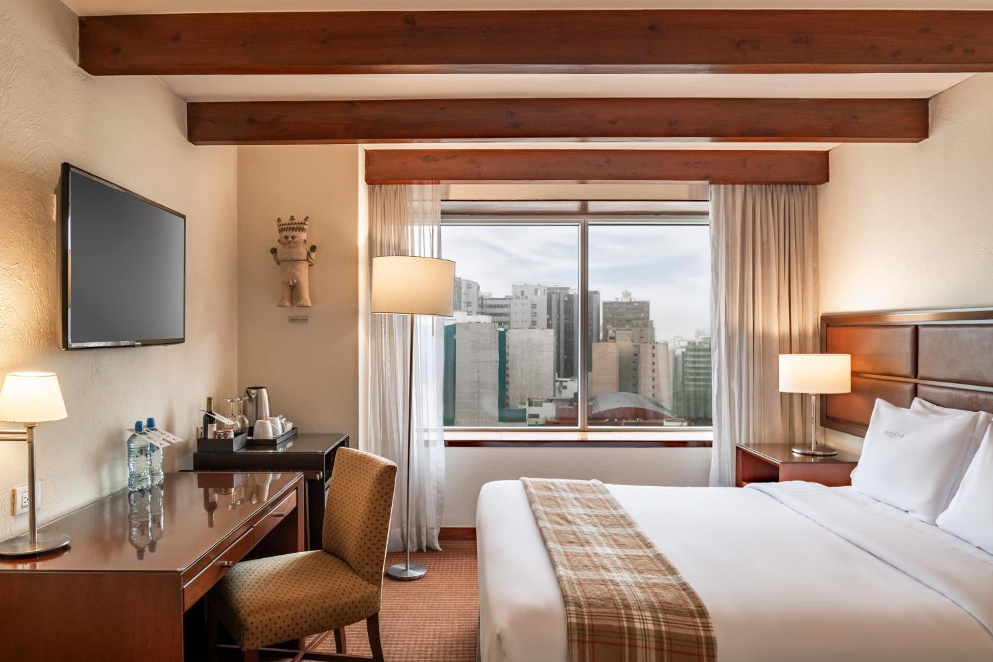Casa Andina Premium Miraflores Lima Extérieur photo A guest room at the InterContinental Santiago